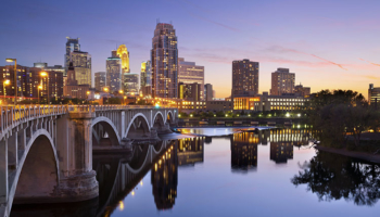 Minneapolis Skyline at Dusk. SMR Group is Recruiting for a Cleared Federal Security Manager/ FSO.